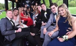 Prom group happily enjoying in Limousine by Metrowest Limousine